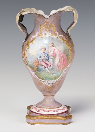 A 19th Century Continental enamelled on copper urn with a fete gallant view with leaf shaped handles and musical motifs, painted mark to base J B 17cm 