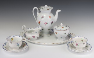 A 20th Century Meissen breakfast set comprising tray, coffee pot (chip to lid), milk jug, sugar bowl and cover, 2 cups and saucers decorated with spring flowers 