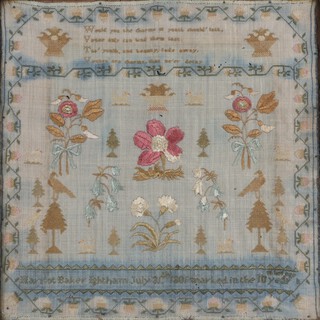 A 19th century sampler by Harriot Baker Ightham with verse above a central panel of flowers, trees, bouquets, dogs and birds enclosed in a strawberry border, dated July 31st 1801, â€˜marked in the 10 year of her ageâ€™, 32cm x 32cm.
