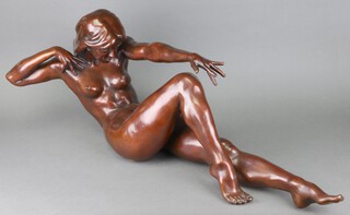 Ronald Cameron (British 1930-2013) "Infinity", a bronze study of a reclining naked lady, signed "R Cameron" and editioned 4/8, 109cm (illustrated on centre pages of the catalogue).