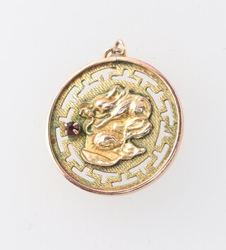 A 14ct yellow gold Chinese pendant decorated a dragon and character 2.8 grams 