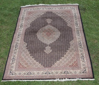 A blue and white ground floral patterned  North Persian rug with central medallion within a multi row border 247cm x 168cm 