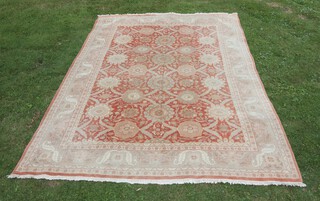 A salmon and white ground Sultanabad floral patterned carpet 398cm x 298cm 