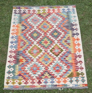 A white, green and tan ground Chobi Kilim rug 147cm x 102cm 