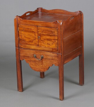 A Georgian mahogany tray top commode enclosed by a panelled door, the base fitted a commode tray 79cm h x 50cm w x 46cm 