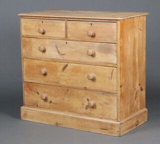 A Victorian stripped pine chest of 2 short and 3 long drawers with replacement turned handles, raised on a platform base 98cm h x 105cm w x 53cm d 