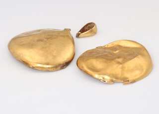 A yellow gold, testing as 14ct, locket 9.2 grams 