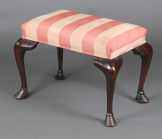 A Georgian rectangular mahogany stool upholstered in yellow striped material, raised on cabriole and hoof supports 45cm h x 62cm w x 47cm d 