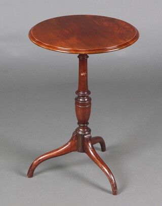 A 19th Century circular mahogany wine table, raised on a turned column and tripod base 67cm h x 46cm diam. 