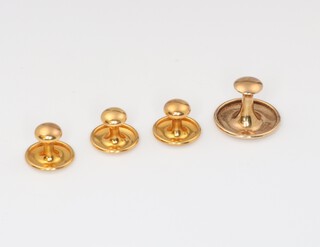 Four 9ct yellow gold studs, 2.8 grams 