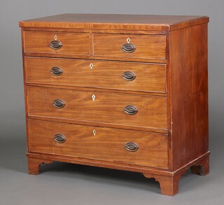 A Georgian mahogany chest of 2 short and 3 long drawers with replacement brass plate drop handles, raised on bracket feet 97cm h x 103cm w x 50cm d Please note that due to Ivory laws, the ivory escutcheons have been removed.