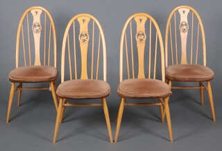 Ercol, a set of 4 Ercol swan back beech and elm dining chairs, raised on turned supports with H framed stretchers 100cm h x 46cm w x 45cm d (contact marks in places)