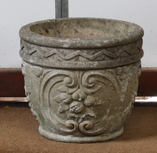 A well weathered concrete garden planter with cast decoration 27cm x 31cm 
