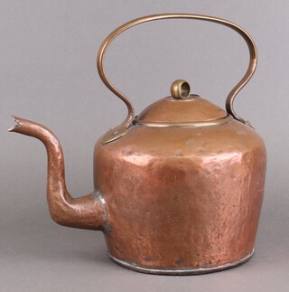 A 19th Century copper kettle with brass handle 38cm 