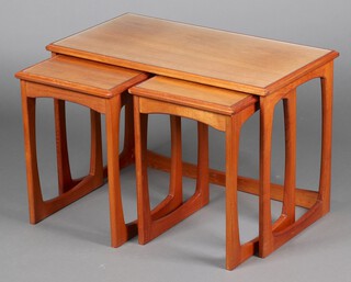 A mid-century teak nest of 3 Astro style coffee tables with plate glass tops 50cm h x 76cm w x 41cm d 