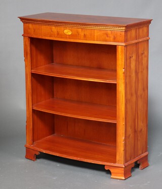 A Regency style yew inlaid open bowed bookcase 107cm by 91cm by 41cm