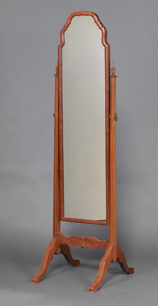 A Queen Anne style arched plate cheval mirror contained in a walnut swing frame 159cm x 40cm x 51cm (silvering to the mirror is showing signs of deterioration)