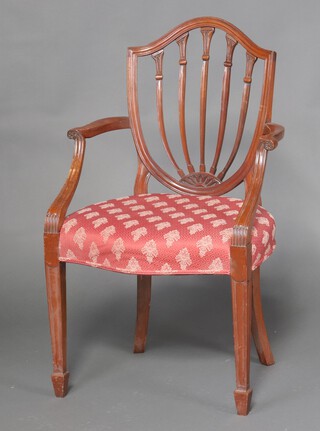 A Hepplewhite style stick back carver chair with overstuffed seat 96cm h x 56cm w 