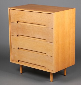Grange and Branches for Stag, a mid-century bleached teak chest of 4 long drawers, raised on turned supports 91cm h x 75cm w x 46cm d (light pitting to the top) 