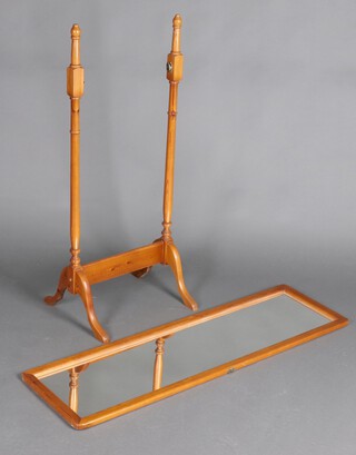 A rectangular plate cheval mirror contained in a pine swing frame 132cm h x 48cm w x 41cm d (fitments to 1 side missing) 