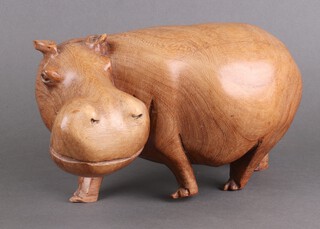 An Eastern polished hardwood figure of a standing hippopotamus 19cm x 30cm x 12cm 