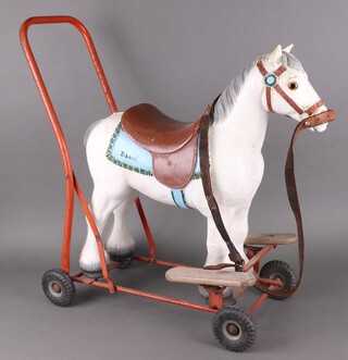 A Triang white plastic and metal push along figure of a horse 61cm x 48cm x 27cm 