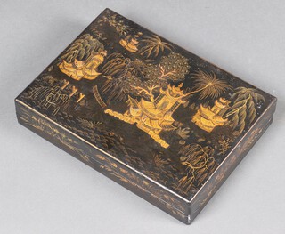 A Chinese rectangular black and gilt lacquered shallow box the lid decorated pagodas 7cm x 35cm x 25cm 