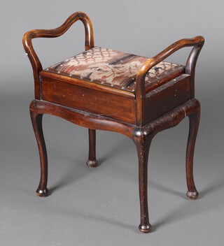 An Edwardian beech framed box seat piano stool, raised on cabriole supports 62cm h x 57cm w x 36cm d 