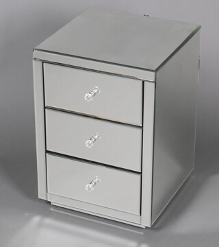 A mirrored beside chest of 3 drawers, 57cm h x 40cm w x 40cm d (crack to back left hand edge of mirrored panel)