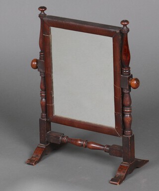 A 19th Century rectangular plate dressing table mirror contained in a turned mahogany swing frame 41cm h x 30cm w x 16cm d 