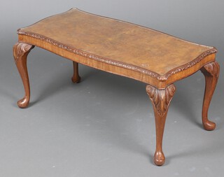 A Queen Anne style rectangular walnut coffee table on cabriole supports 44cm h x 91cm w x 42cm d 