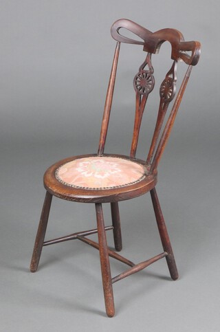 An Arts and Crafts beech splat back chair with pierced bar back, circular seat, raised on turned supports with H framed stretcher 81cm h x 36cm (old repair to back)