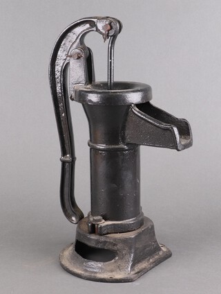 An ornamental iron garden pump 38cm h x 23cm