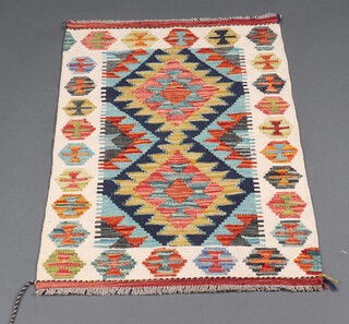 A white, turquoise and green Chobi Kilim rug 89cm x 59cm