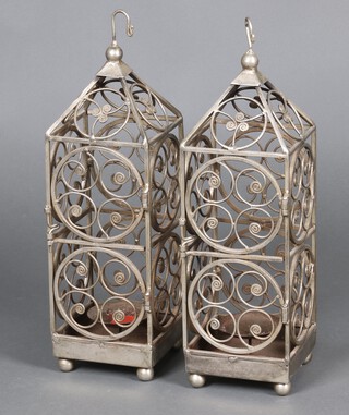 Two square pierced metal candle lanterns 50cm h x 15cm w x 15cm d