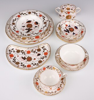 Fourteen pieces of Royal Crown Derby Imari pattern style tea/dinner ware comprising 2 plates (1 second), side plate, soup bowl, 2 tea plates, 2 saucers, bowl, tea cup, small bowl, twin handled soup cup, lidded sugar bowl and a crescent shaped salad plate A962 XXXIVIII 