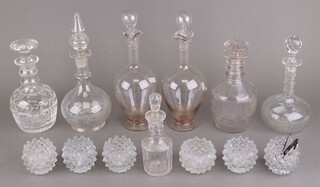 A 19th Century mallet shaped 3 ring decanter and mushroom stopper 23cm, 6 other decanters and items of glassware