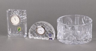 A Waterford Crystal glass bottle cooler 9cm, a timepiece 11cm, ditto 7cm 