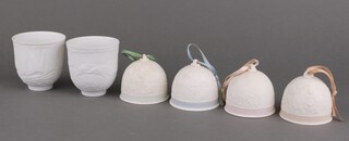 Four LLadro Christmas tree bells 1991 - 1994 and 2 Lladro moulded vases decorated with dolphins and sailing boats 