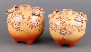 A pair of 1930's Japanese vases with butterfly handles and floral decoration 13cm 