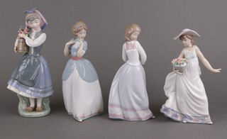 Four Lladro figures -  girl holding a jug of flowers 26cm, lady with jug of flowers  6755 23cm, another 6754 22cm and 1 other holding a basket of flowers 5790 22cm 