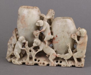 A Chinese carved hardstone vase decorated with monkeys 18cm 