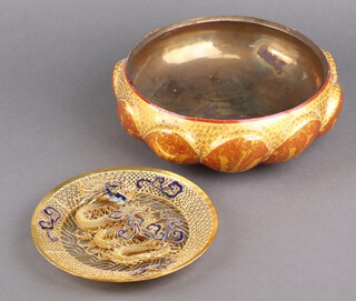 A 20th Century gilt and enamelled circular plaque decorated with a dragon 20cm together with a 20th Century papier mache painted scalloped bowl
