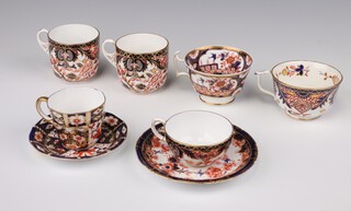 Two Victorian Royal Crown Derby Imari pattern cups (cracked), a Royal Crown Derby  cup and saucer, 3 other cups and a saucer 