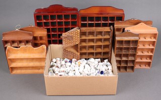 A large collection of porcelain and other thimbles together with 8 display racks 