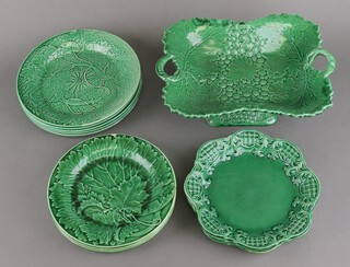 A Victorian Wedgwood green glazed leaf pattern part dessert service comprising 5 medium plates (4 a/f), 3 small plates (2 a/f), 3 shaped dishes (2 a/f) and a tazza 