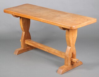 A rectangular elm refectory dining table, raised on shaped supports with H framed stretcher 77cm h x 153cm l x 56cm w 