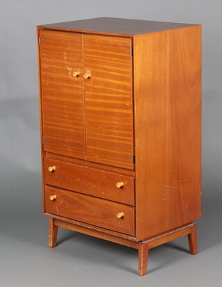 Minty, a mid-century teak tall boy, fitted shelves enclosed by panelled doors above 2 drawers, on square supports 108cm h x 61cm w x 45cm d 