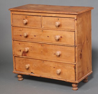 A 19th Century pine chest of 2 short and 3 long drawers with later replacement turned handles, raised on bun feet 92cm h x 93cm w x 45cm d (ring mark to top)