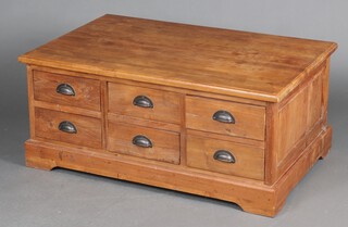 A rectangular hardwood chest of 12 drawers 50cm h x 115cm w x 45cm d 